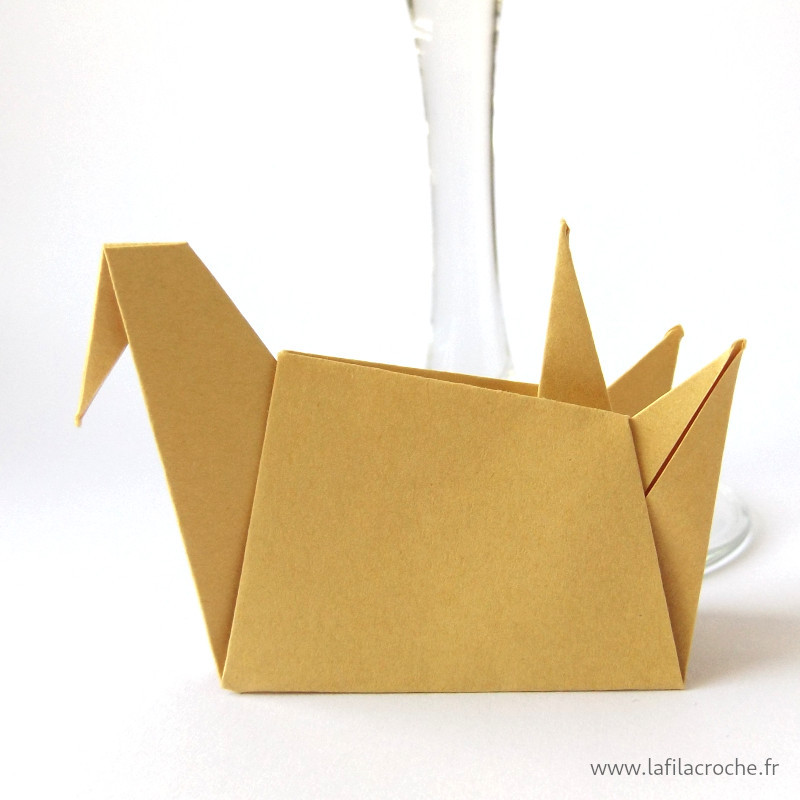 Marque-place grue assise origami sable